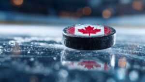Canadian sports puck on fresh ice with a clear Canada logo at center