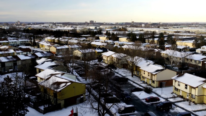 A snowy Ottawa neighborhood viewed from above on a quiet winter day