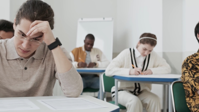 Students sit quietly during a standardized exam in an Ontario classroom